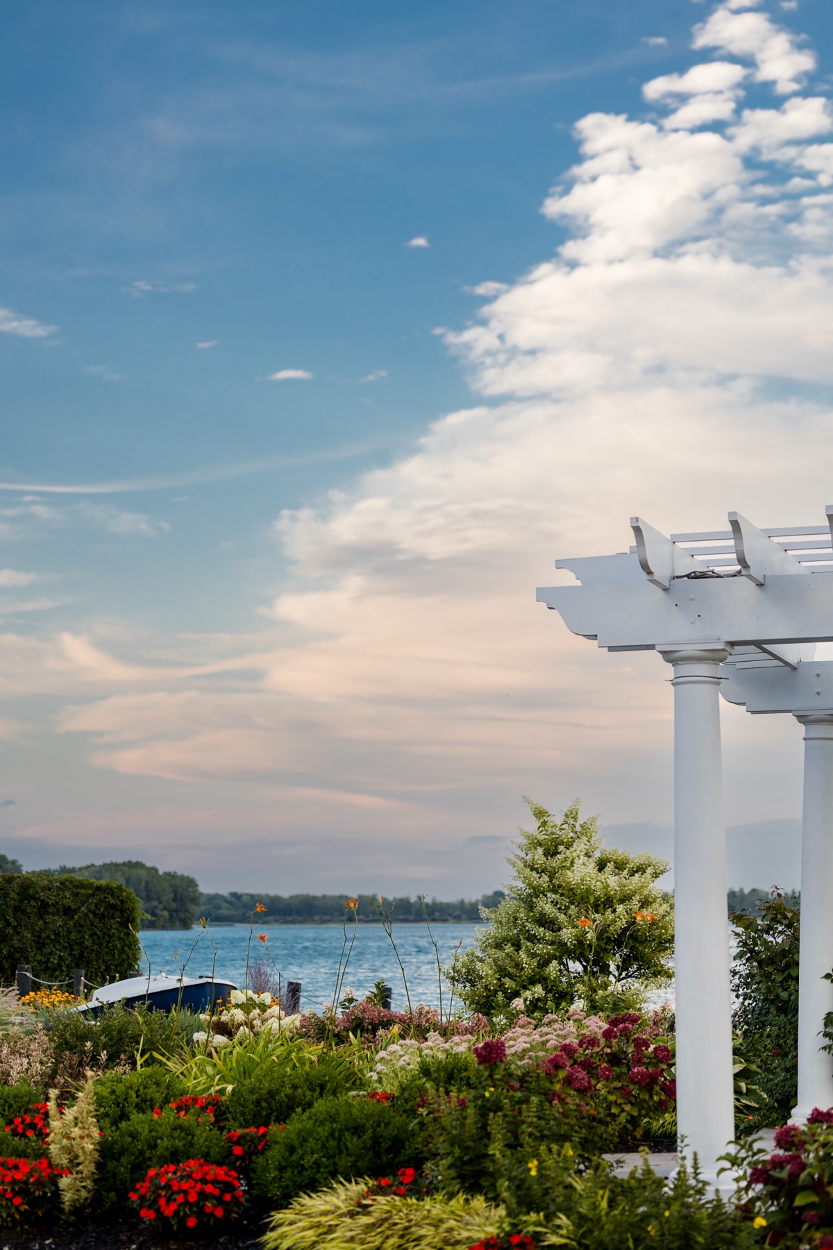 The pergola and flower beds looking out over the Detroit River